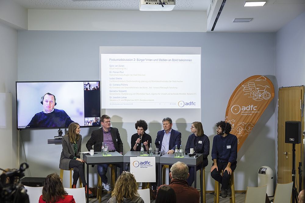ADFC | Symposium „Mit Schnellausbau zum Fahrradland 2030“ am 6. Dezember 2022 ADFC | Symposium „Mit Schnellausbau zum Fahrradland 2030“ am 6. Dezember 2022